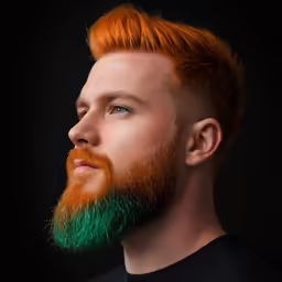 man with red beard and green hair looking sideways