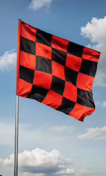 a flag flying high in the sky under some clouds