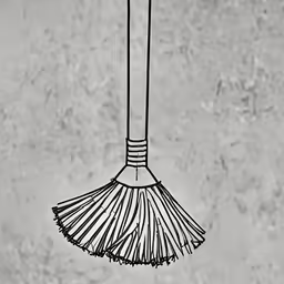 an artistic photo of a broom on the ceiling