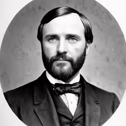 an old photo of a man in a suit with a bow tie