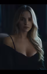 a beautiful woman is posing in a dark room