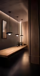 long wooden bench with two light fixtures in dark room