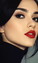 a woman with red lips and black hair