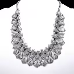 a black and white drawing of a necklace on a mannequin torso,a close up of a necklace with various shapes,an artistic drawing of a metal necklace,a white torso wearing a large black and silver necklace,a very nice necklace with geometric shapes