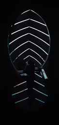 a man is working on a device in the dark