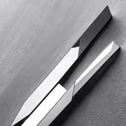 two knives on black surface, each with two different handles