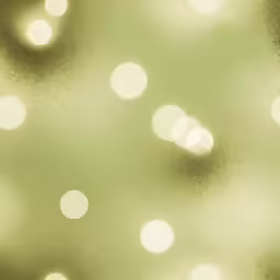 the back side of a glass with lots of white circles