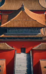 a building with a long staircase near a roof