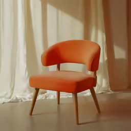 a chair with a wooden leg and orange fabric