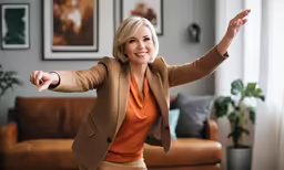 a woman dressed in brown with a blazer is dancing
