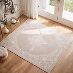 a room with white carpeting and floor with wooden floor