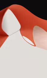 a computer keyboard on a black table with orange and white background
