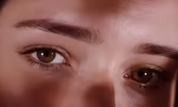 close up photo of eyes and eyebrows of a woman