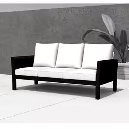 a simple sofa sitting on a tiled floor