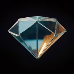 there is a glass and metal object on the dark surface