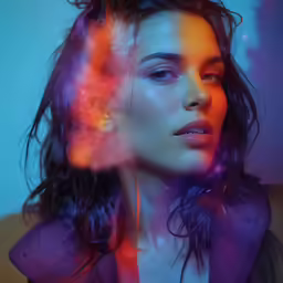 a woman with dark hair and red glowing lights on her head