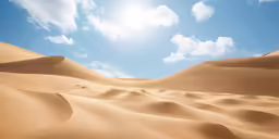 sand dunes are being photographed under a blue sky
