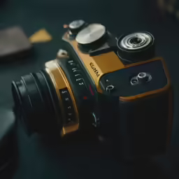 a close up of a camera that is on a table