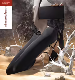 the beautiful woman is wearing high heels and a black bra