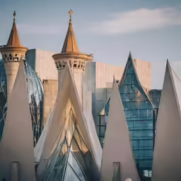 architectural buildings and spires of a church in a town