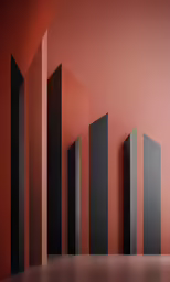 a wall with four black blocks that are arranged to form a vertical line