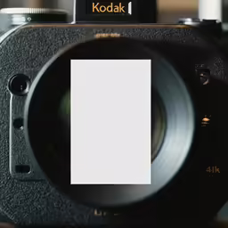 a small square is on the side of a camera