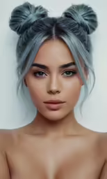 the young woman has blue hair and is looking up