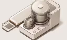 an image of a food processor with a cell phone