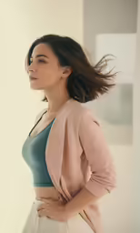 a woman in a black top is standing