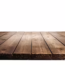 a wooden table top made of boards that are stained brown