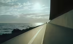 a person is riding a motorcycle down the road