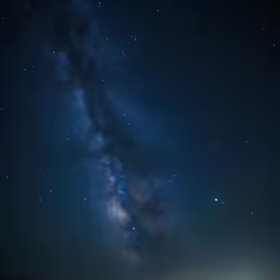 there is a large, dark sky with a star filled night sky
