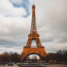 a car parked in front of the eiffel tower