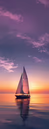a sailboat is on the water with a purple and pink sky
