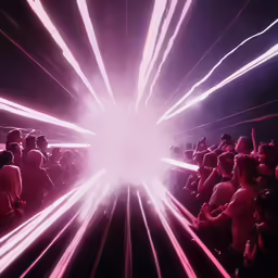 a light tunnel with many lights moving through the center