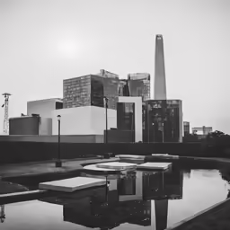 an old photo with some sort of buildings and trees