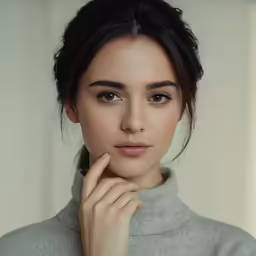 a woman is looking at the camera with a thoughtful look on her face