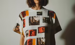 a women who is wearing an oversized tshirt made out of photos