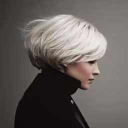 an artistic and short blonde haircut