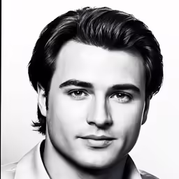 a man in an office dress shirt looks at the camera