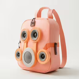a bag with speakers sitting inside of it