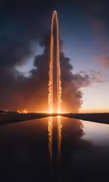 the sun is setting on top of a tall building