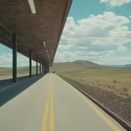 a car is parked at an overpass on the highway