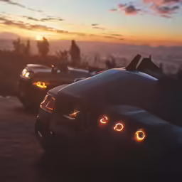 the front lights of some cars at dusk