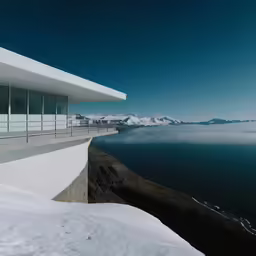 a very tall building overlooking some very long water