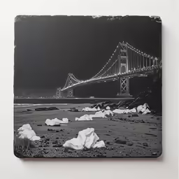 black and white photograph of a night over the bay bridge
