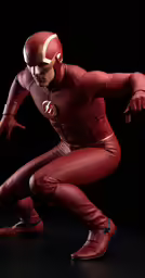a man dressed as the flash in red suit
