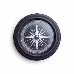 a black compass hanging from the wall