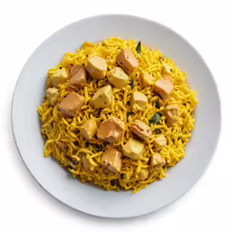 a plate that has noodles, tofu and greens in it