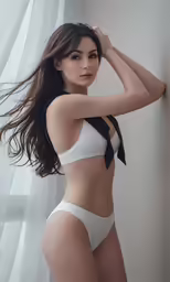 woman in sexy white bikini posing for the camera